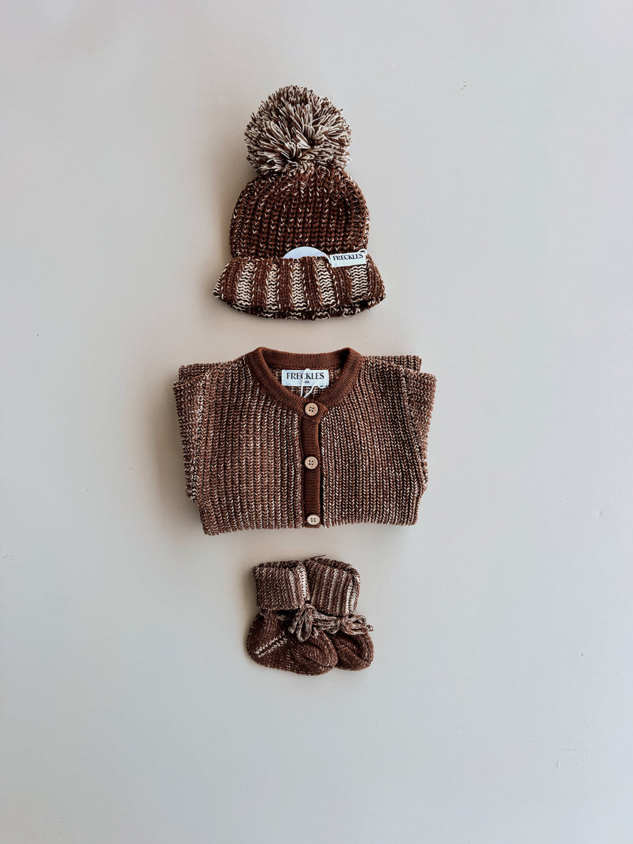 Freckles Chunky Full Romper in Chocolate styled with a beanie and booties (not included)