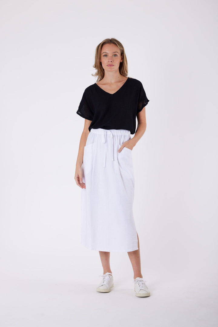 Isla Linen Midi Skirt in White, worn with a black tee, model shot 1