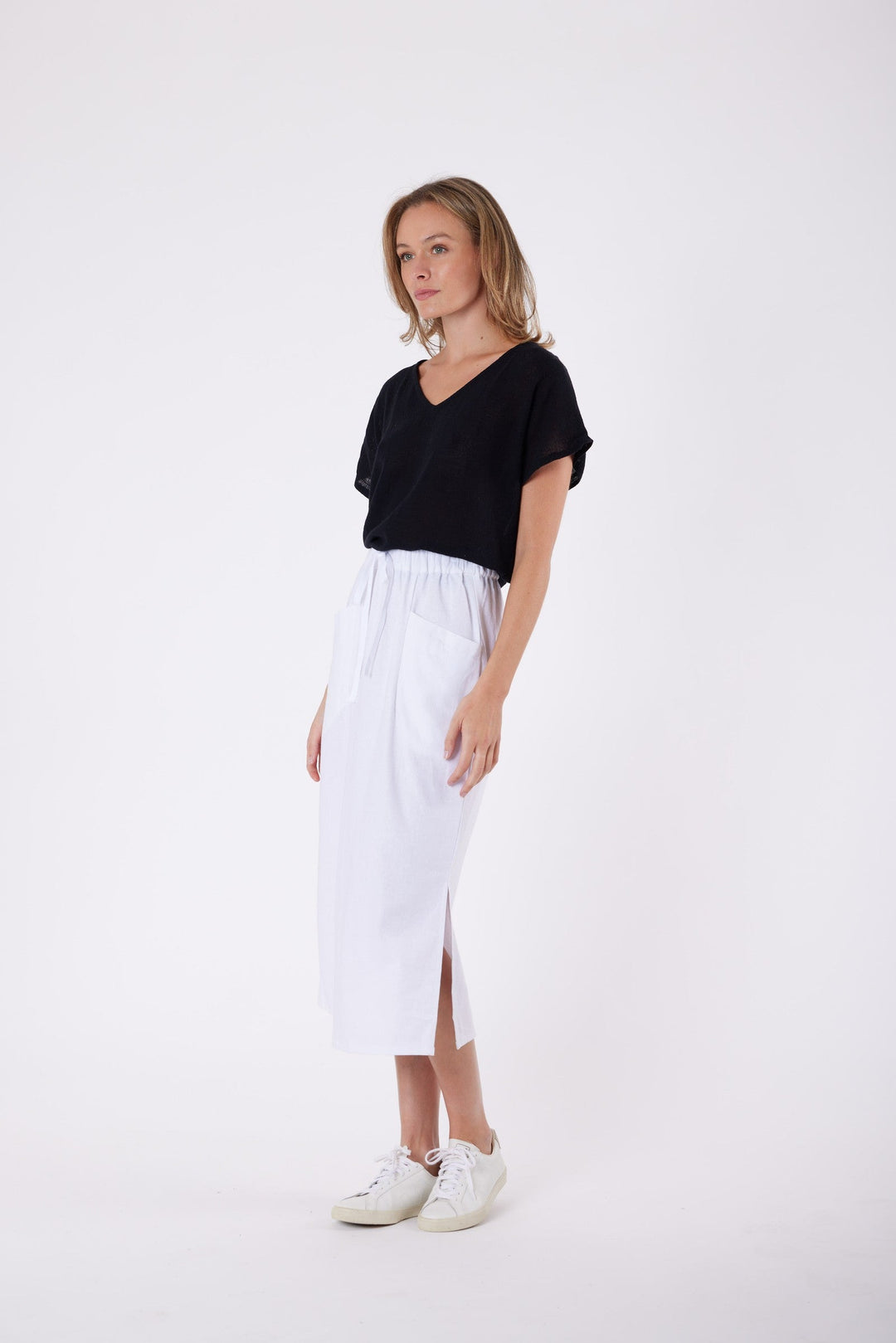 Isla Linen Midi Skirt in White, worn with a black tee, model shot 3