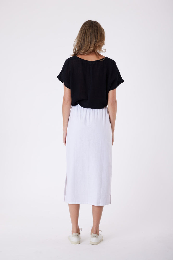 Isla Linen Midi Skirt in White, worn with a black tee, model shot 5