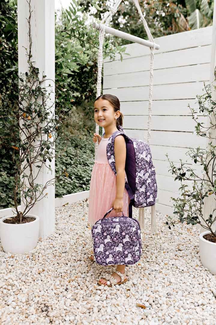 Confetti Kidz Early Years Backpack in Dreamy Unicorn, the larger Junior size shown on the model, with the matching lunch bag (lunch bag not included)