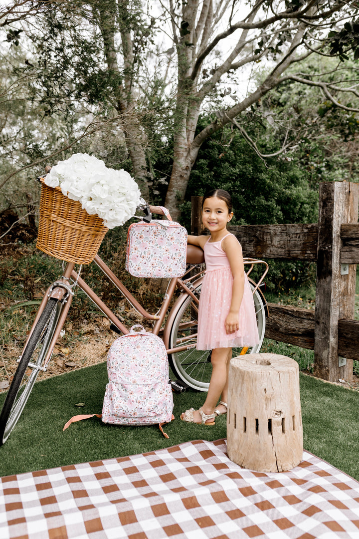 Confetti Kidz Early Years Backpack in Peach Blossom, shown with the matching lunch bag (lunch bag not included)