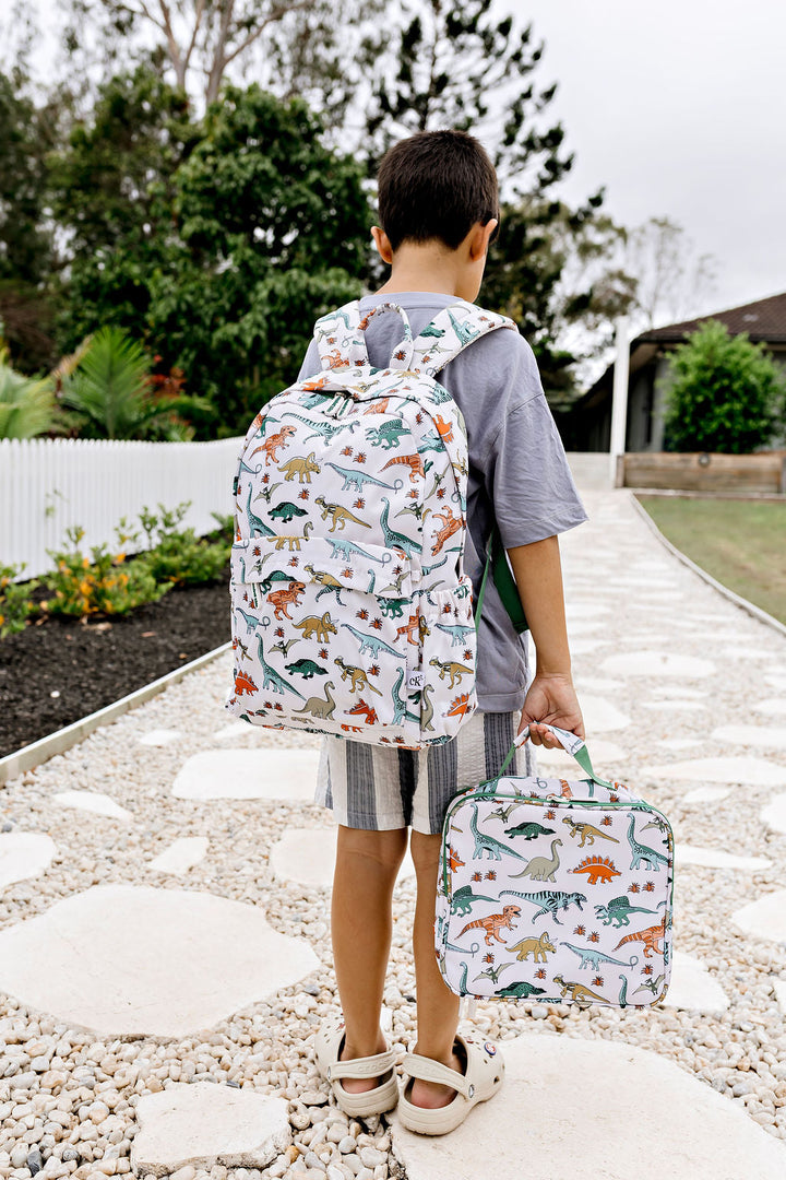 Confetti Kidz Junior Backpack in Dino Land, shown with the matching lunch bag (lunch bag not included)