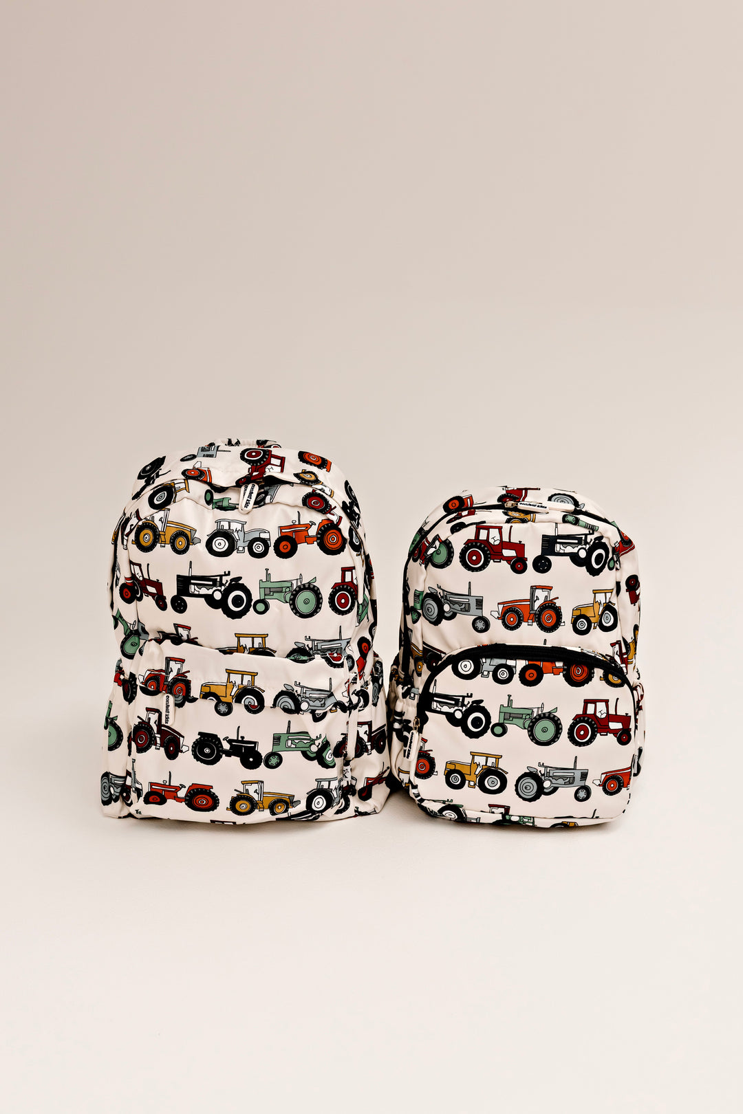Confetti Kidz Junior Backpack in Farmyard Fun, shown with the smaller Early Years size (sold separately)
