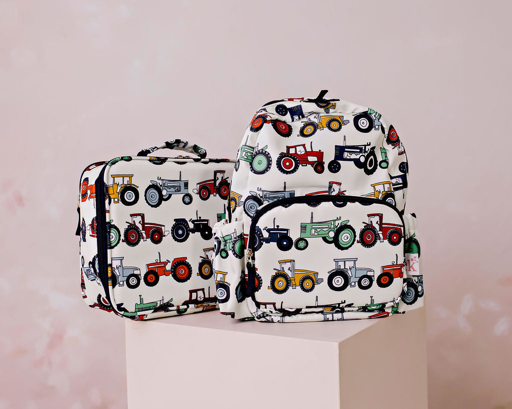 Confetti Kidz Junior Backpack in Farmyard Fun, shown with the matching lunch bag (lunch bag not included)