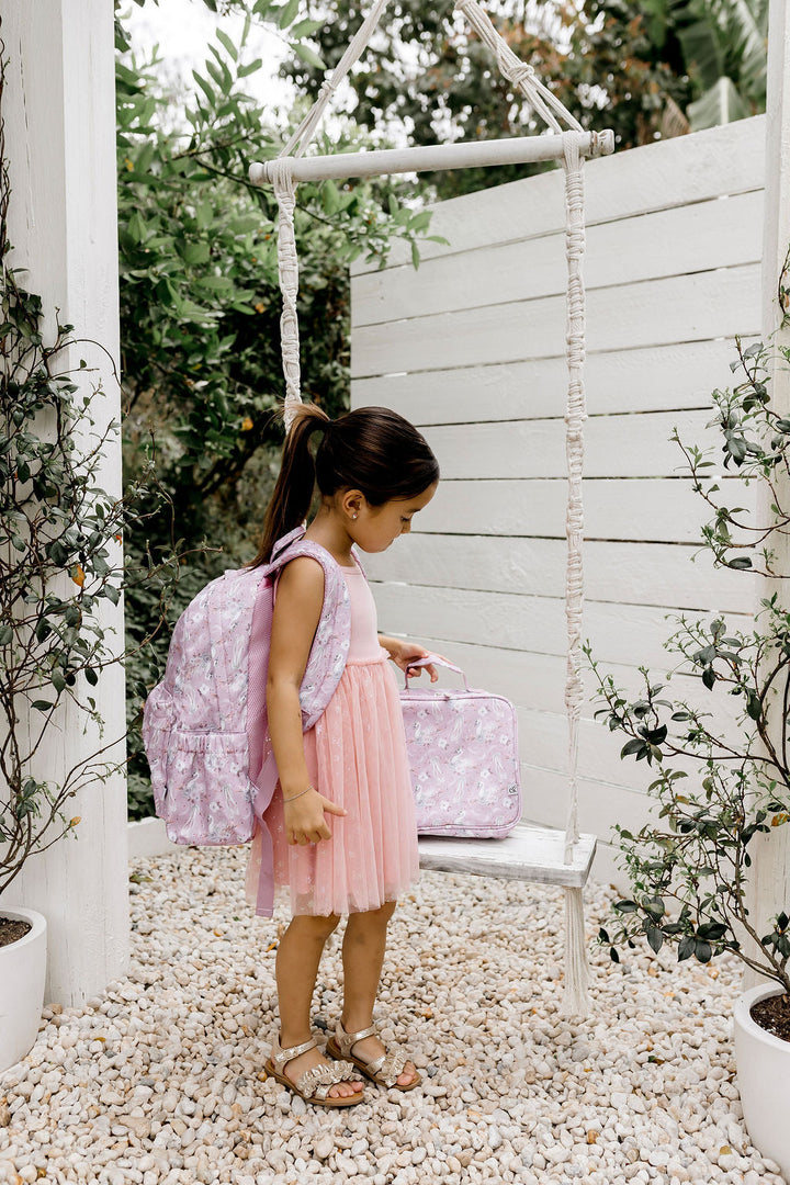 Confetti Kidz Junior Backpack in Swan Dancer, shown with the matching lunch bag (lunch bag not included)