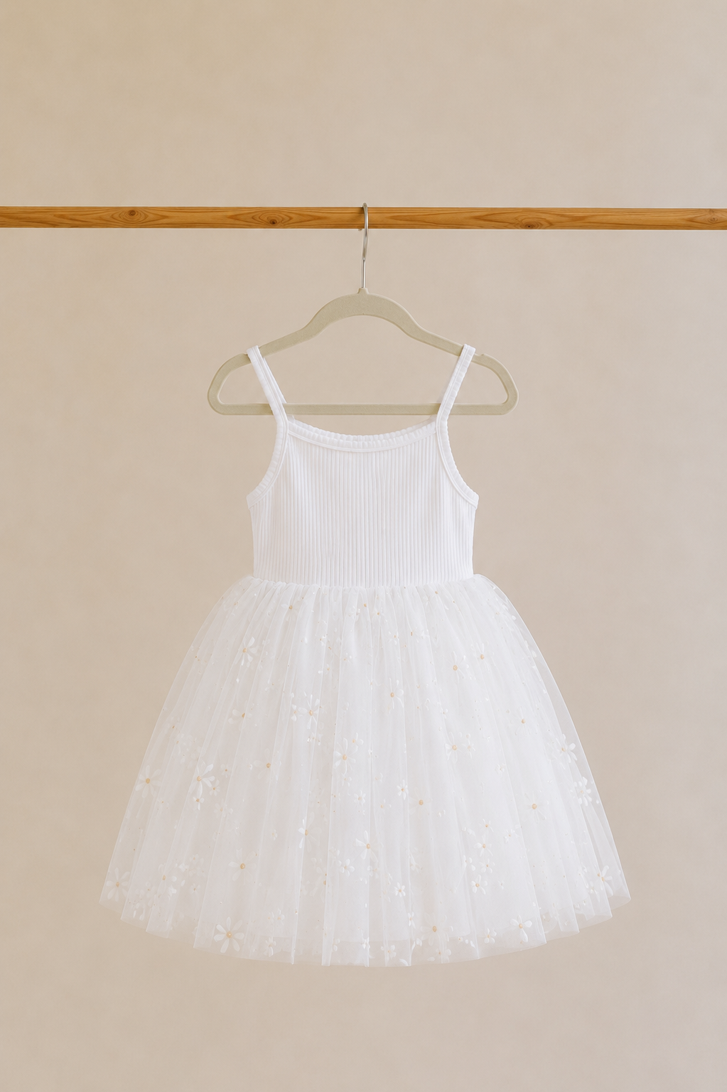 Confetti Kidz Ribbed Tulle Dress in Golden Daisies, white ribbed bodice with golden daisy print over a full tulle skirt, shown on its own